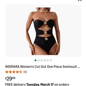 Black One-Piece Swimsuit with Gold Starfish Accents and Cutouts